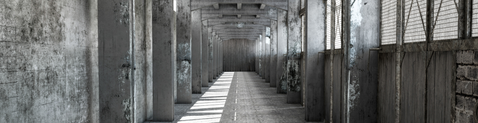 Image of a dilapidated warehouse for article header.