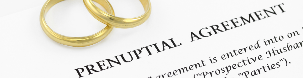 Image of a Prenuptial Agreement and Wedding Rings